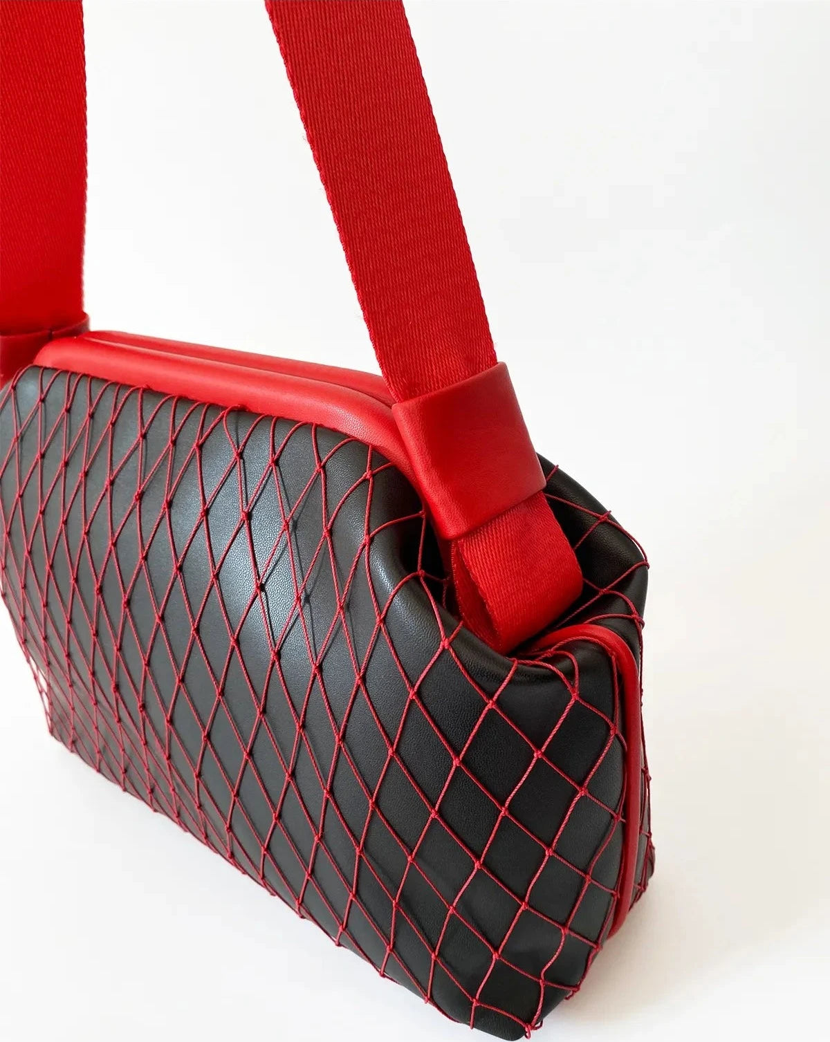 Stylish Black Faux Leather Handbag with Red Mesh Detailing handbags LUNARITY GARAGE   